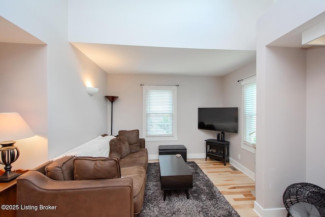 129 E Park Pl, Jeffersonville, IN 47130 - living room with light wood finished floors and a wood stove