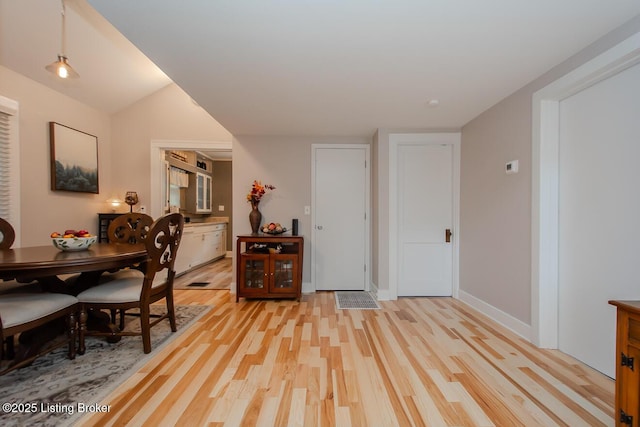 129 E Park Pl, Jeffersonville, IN 47130 - dining area with light wood-type flooring and baseboards