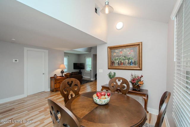 129 E Park Pl, Jeffersonville, IN 47130 - dining area featuring light wood-style floors and lofted ceiling