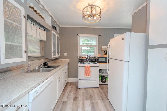 129 E Park Pl, Jeffersonville, IN 47130 - kitchen with white appliances, light wood-type flooring, white cabinetry, light countertops, and ornamental molding