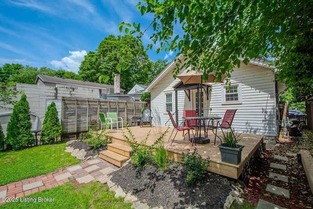 129 E Park Pl, Jeffersonville, IN 47130 - wooden terrace with outdoor dining area