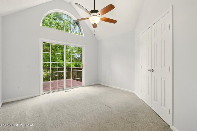 11411 Catalpa View Ct, Louisville, KY 40299 - unfurnished bedroom featuring carpet flooring, access to outside, high vaulted ceiling, a closet, and a ceiling fan