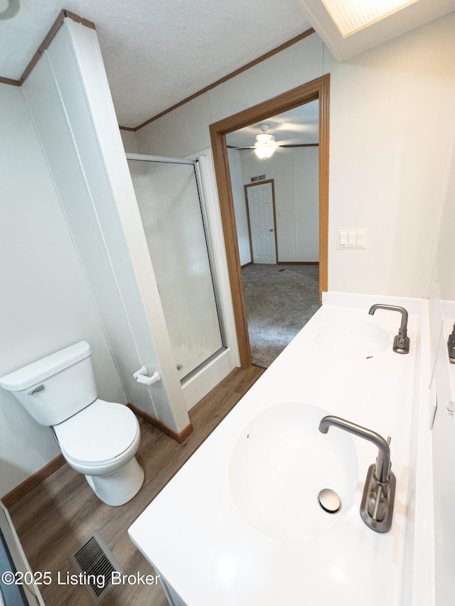 77 Old Ky 259th Rd, Mcdaniels, KY 40152 - full bath featuring a stall shower, wood finished floors, crown molding, double vanity, and a ceiling fan