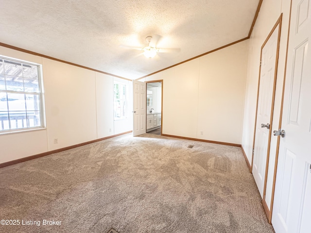 77 Old Ky 259th Rd, Mcdaniels, KY 40152 - unfurnished room featuring ornamental molding, light carpet, lofted ceiling, a textured ceiling, and a ceiling fan