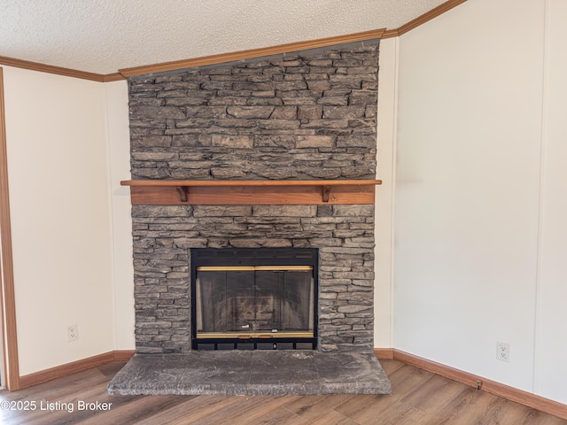 77 Old Ky 259th Rd, Mcdaniels, KY 40152 - detailed view of wood finished floors, a textured ceiling, a stone fireplace, and crown molding