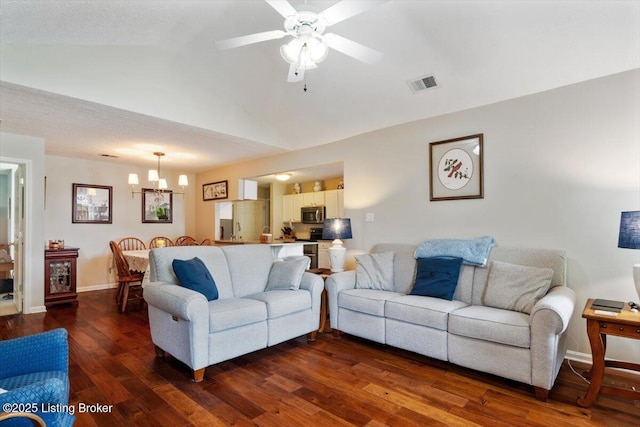 11300 Rdg Lake Dr, Louisville, KY 40272 - living area featuring a chandelier, ceiling fan, dark wood-style floors, and vaulted ceiling