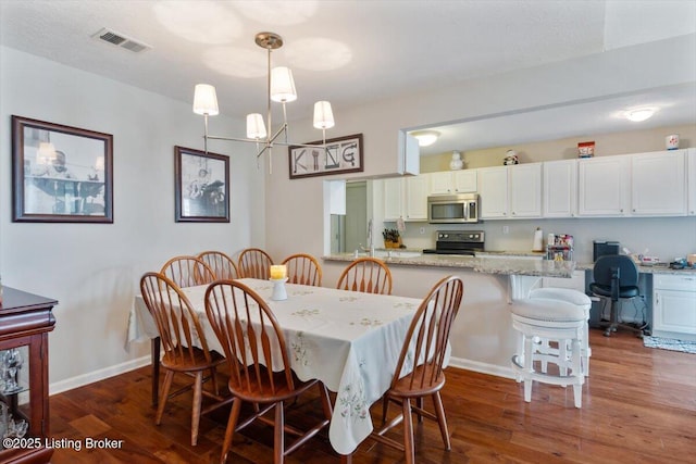 11300 Rdg Lake Dr, Louisville, KY 40272 - dining space featuring dark wood-style floors and a desk