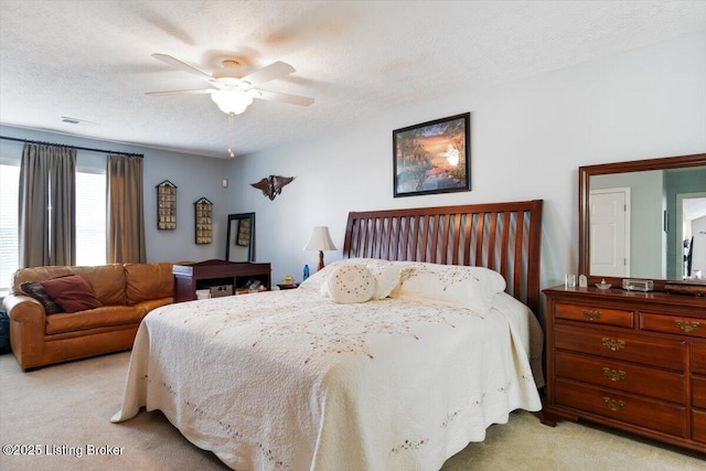11300 Rdg Lake Dr, Louisville, KY 40272 - bedroom featuring light colored carpet, a textured ceiling, and a ceiling fan