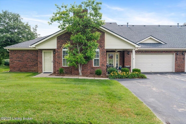 11300 Rdg Lake Dr, Louisville, KY 40272 - view of front of house featuring asphalt driveway, a front lawn, brick siding, a garage, and a chimney