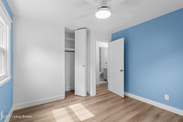 4900 Glenna Way, Louisville, KY 40219 - unfurnished bedroom featuring a closet, wood finished floors, and ceiling fan