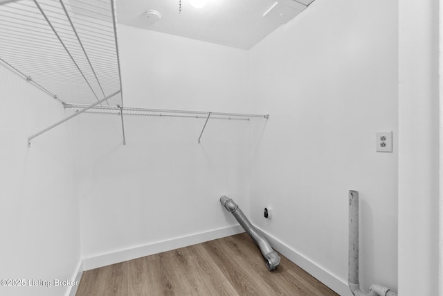 4900 Glenna Way, Louisville, KY 40219 - washroom with electric dryer hookup and wood finished floors