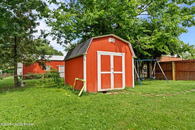 4900 Glenna Way, Louisville, KY 40219 - view of shed with a fenced backyard and a playground