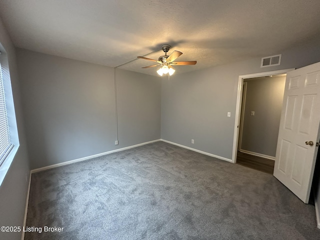 7070 Wildwood Cir Unit 154, Louisville, KY 40291 - spare room featuring a ceiling fan and dark colored carpet