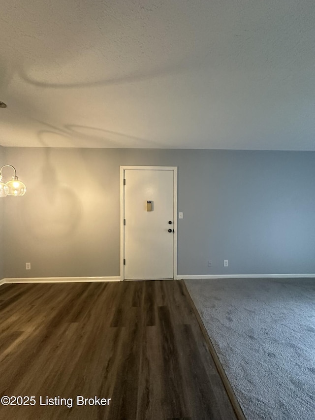 7070 Wildwood Cir Unit 154, Louisville, KY 40291 - entryway with baseboards and dark wood finished floors