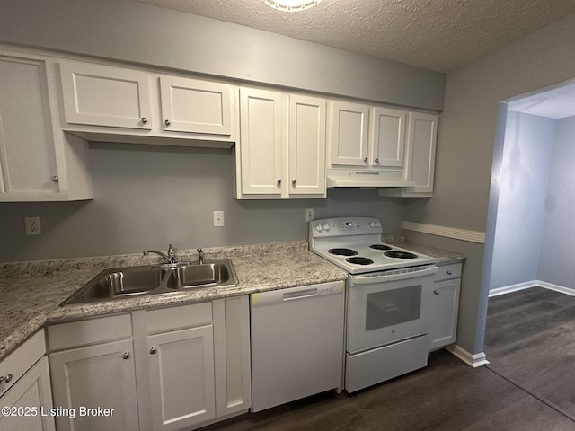 7070 Wildwood Cir Unit 154, Louisville, KY 40291 - kitchen featuring white appliances, under cabinet range hood, white cabinetry, dark wood-style flooring, and a textured ceiling