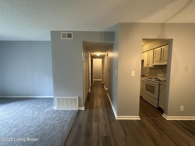 7070 Wildwood Cir Unit 154, Louisville, KY 40291 - corridor with dark wood-style floors and a textured ceiling