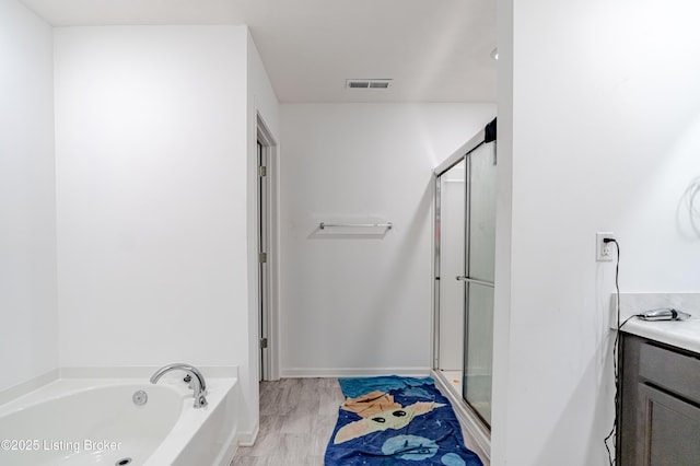 8641 Warbler Br Way, Louisville, KY 40229 - full bathroom featuring vanity, a garden tub, and a shower stall
