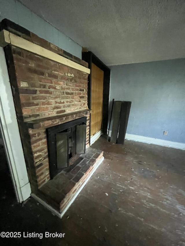 117 N 34th St, Louisville, KY 40212 - unfurnished living room with a fireplace and a textured ceiling
