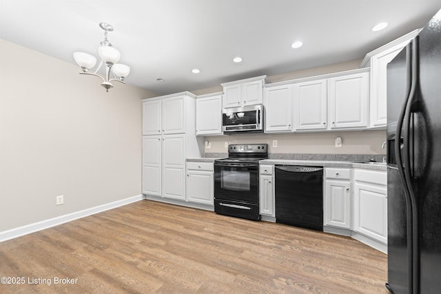 751 N Hite Ave Unit 2, Louisville, KY 40206 - kitchen featuring black appliances, light countertops, white cabinetry, and recessed lighting