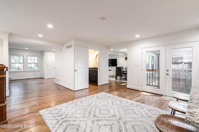 4022 Hycliffe Ave, Louisville, KY 40207 - living area with french doors, wood finished floors, recessed lighting, and ornamental molding