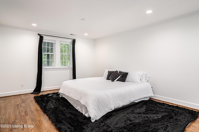 4022 Hycliffe Ave, Louisville, KY 40207 - bedroom with wood finished floors, crown molding, and recessed lighting