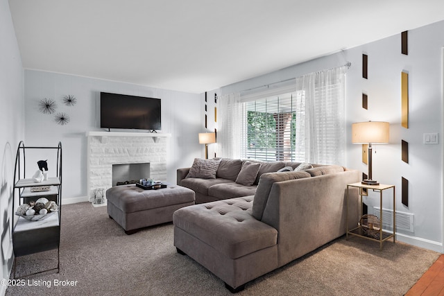 2301 Farnsley Rd, Louisville, KY 40216 - living room featuring a stone fireplace and baseboards