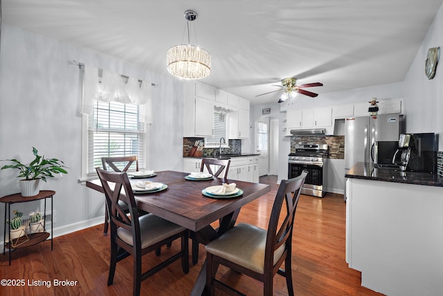 2301 Farnsley Rd, Louisville, KY 40216 - dining area featuring ceiling fan, wood finished floors, and a chandelier