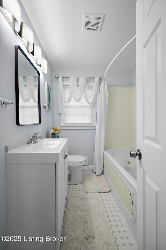 2301 Farnsley Rd, Louisville, KY 40216 - bathroom featuring vanity, shower / bath combo with shower curtain, and tile patterned floors