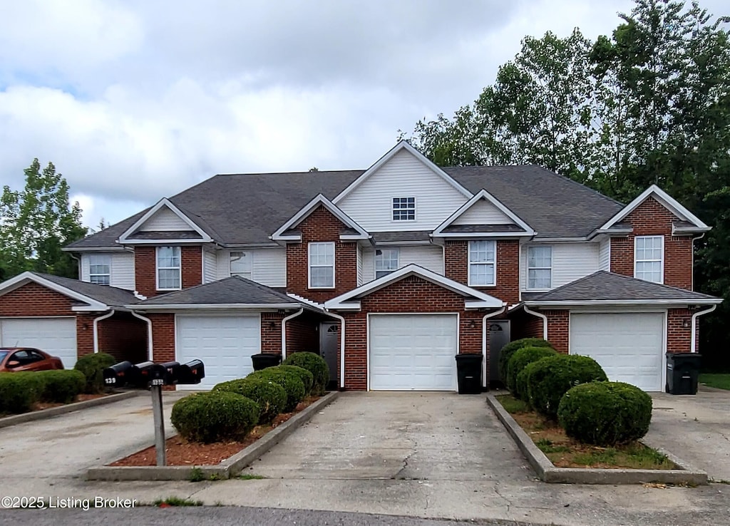 133 Ash Ct, Radcliff, KY 40160 - view of front of home featuring brick siding and concrete driveway