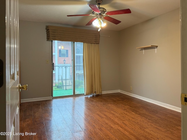 1305 Donard Park Ave, Louisville, KY 40218 - unfurnished room featuring a ceiling fan and dark wood-type flooring