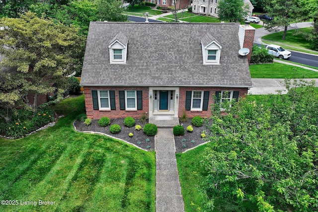 6011 Windsong Ct, Louisville, KY 40207 - cape cod house featuring brick siding, a front yard, and roof with shingles