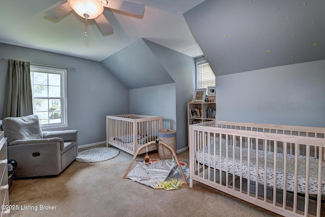 6011 Windsong Ct, Louisville, KY 40207 - carpeted bedroom featuring lofted ceiling, multiple windows, and a ceiling fan