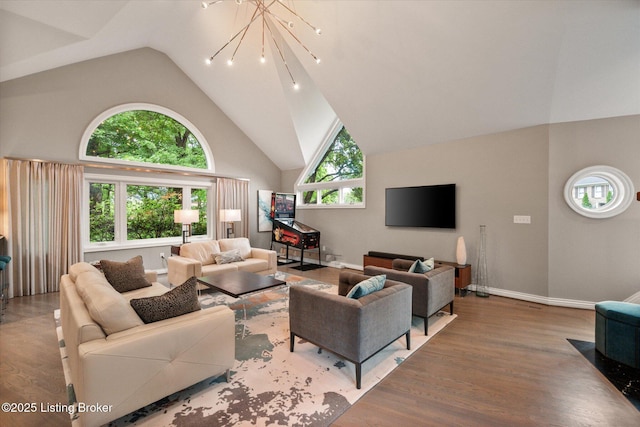 1430 Oakmont Ct, Shelbyville, KY 40065 - living room featuring a chandelier, high vaulted ceiling, and wood finished floors