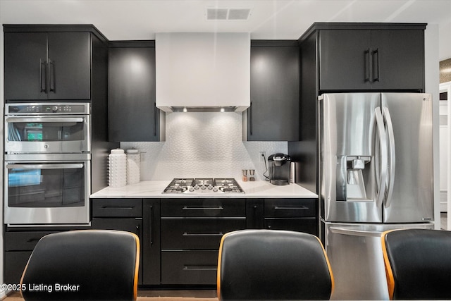 1430 Oakmont Ct, Shelbyville, KY 40065 - kitchen featuring stainless steel appliances, dark cabinets, premium range hood, and light countertops