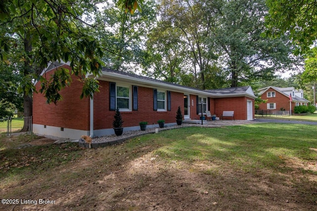 933 Lakeshore Pkwy, Brandenburg, KY 40108 - ranch-style house with brick siding, an attached garage, and crawl space
