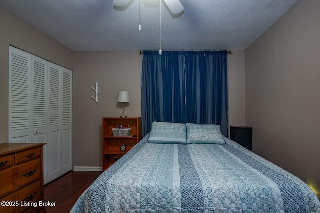 933 Lakeshore Pkwy, Brandenburg, KY 40108 - bedroom featuring dark wood-style flooring, a closet, and ceiling fan