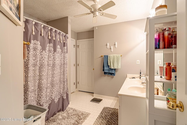4101 Adelaide Ct, Louisville, KY 40241 - full bathroom with tile patterned flooring, ceiling fan, double vanity, a textured ceiling, and a shower with curtain