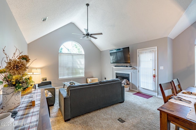 4101 Adelaide Ct, Louisville, KY 40241 - living room with vaulted ceiling, ceiling fan, light carpet, and a fireplace