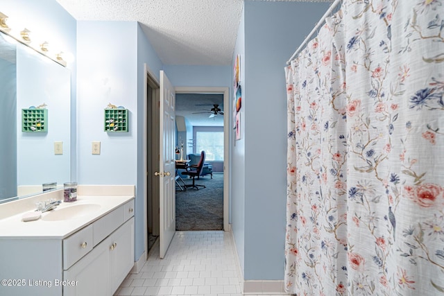 4101 Adelaide Ct, Louisville, KY 40241 - bathroom featuring vanity, tile patterned flooring, a textured ceiling, a shower with shower curtain, and a ceiling fan