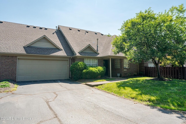 4101 Adelaide Ct, Louisville, KY 40241 - view of front of house featuring brick siding, driveway, a garage, and a shingled roof