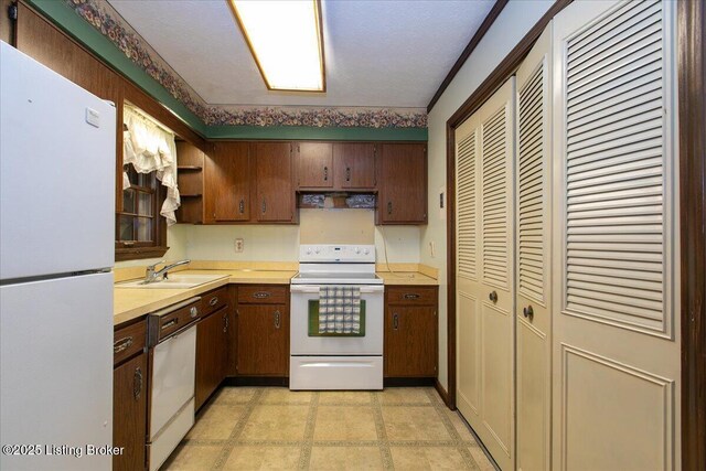 5709 Midnight Ln, Louisville, KY 40229 - kitchen with white appliances, light countertops, and range hood