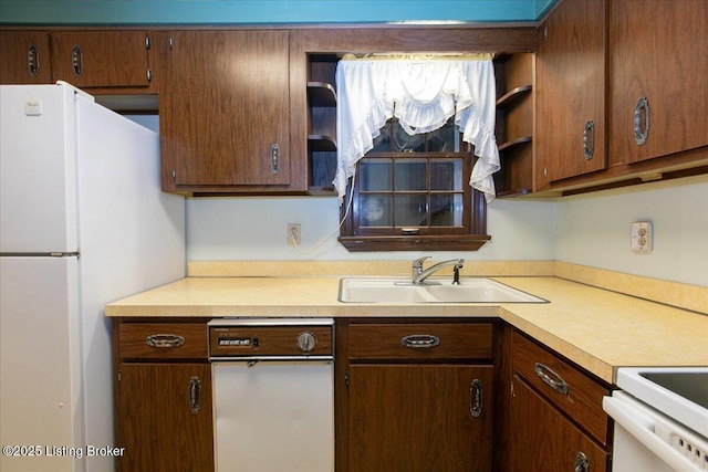 5709 Midnight Ln, Louisville, KY 40229 - kitchen featuring freestanding refrigerator, open shelves, light countertops, and range