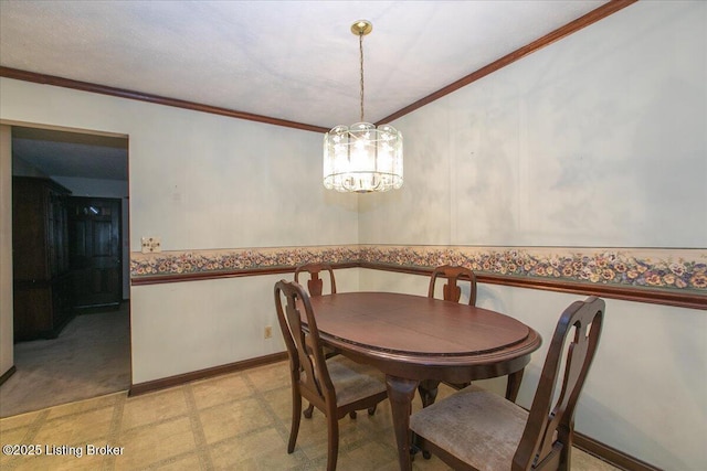 5709 Midnight Ln, Louisville, KY 40229 - dining room with light flooring, a chandelier, crown molding, and wainscoting