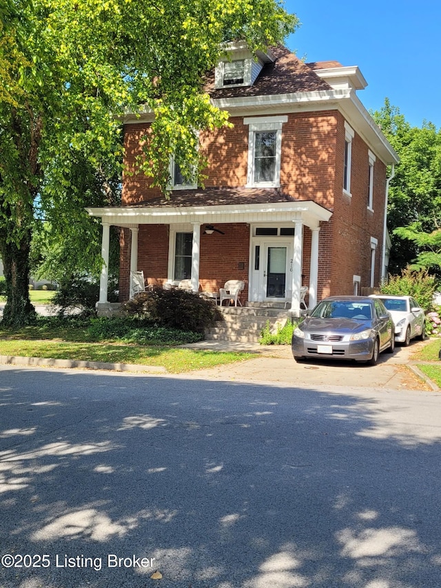 216 6th St, Carrollton, KY 41008 - traditional style home featuring covered porch and brick siding