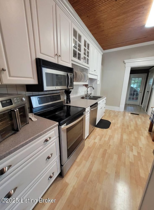 216 6th St, Carrollton, KY 41008 - kitchen featuring stainless steel appliances, wooden ceiling, white cabinetry, tasteful backsplash, and light wood-style floors