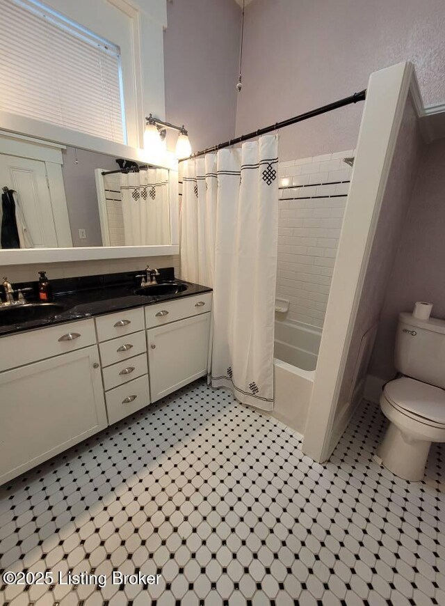 216 6th St, Carrollton, KY 41008 - bathroom featuring double vanity and shower / tub combo