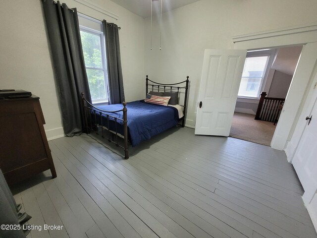 216 6th St, Carrollton, KY 41008 - bedroom with wood-type flooring and baseboards