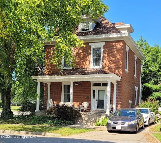 216 6th St, Carrollton, KY 41008 - traditional style home featuring brick siding and a porch