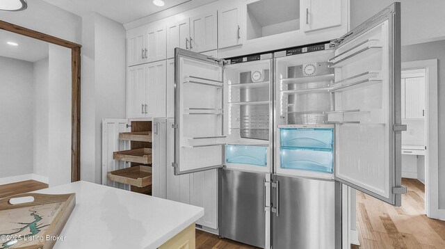 120 Lakelynn Ln, Shelbyville, KY 40065 - kitchen featuring light wood-style floors, white cabinetry, recessed lighting, stainless steel fridge, and light countertops