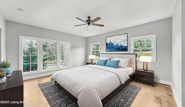 120 Lakelynn Ln, Shelbyville, KY 40065 - bedroom featuring multiple windows, light wood-type flooring, and a ceiling fan